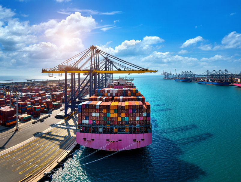 Container terminal with gantry cranes loading a container vessel