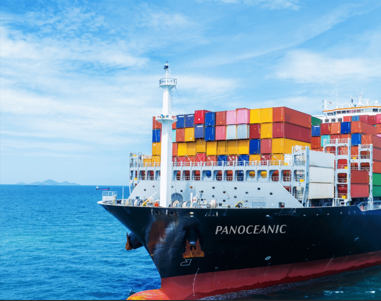 Panoceanic container ship at sea loaded with colourful shipping containers